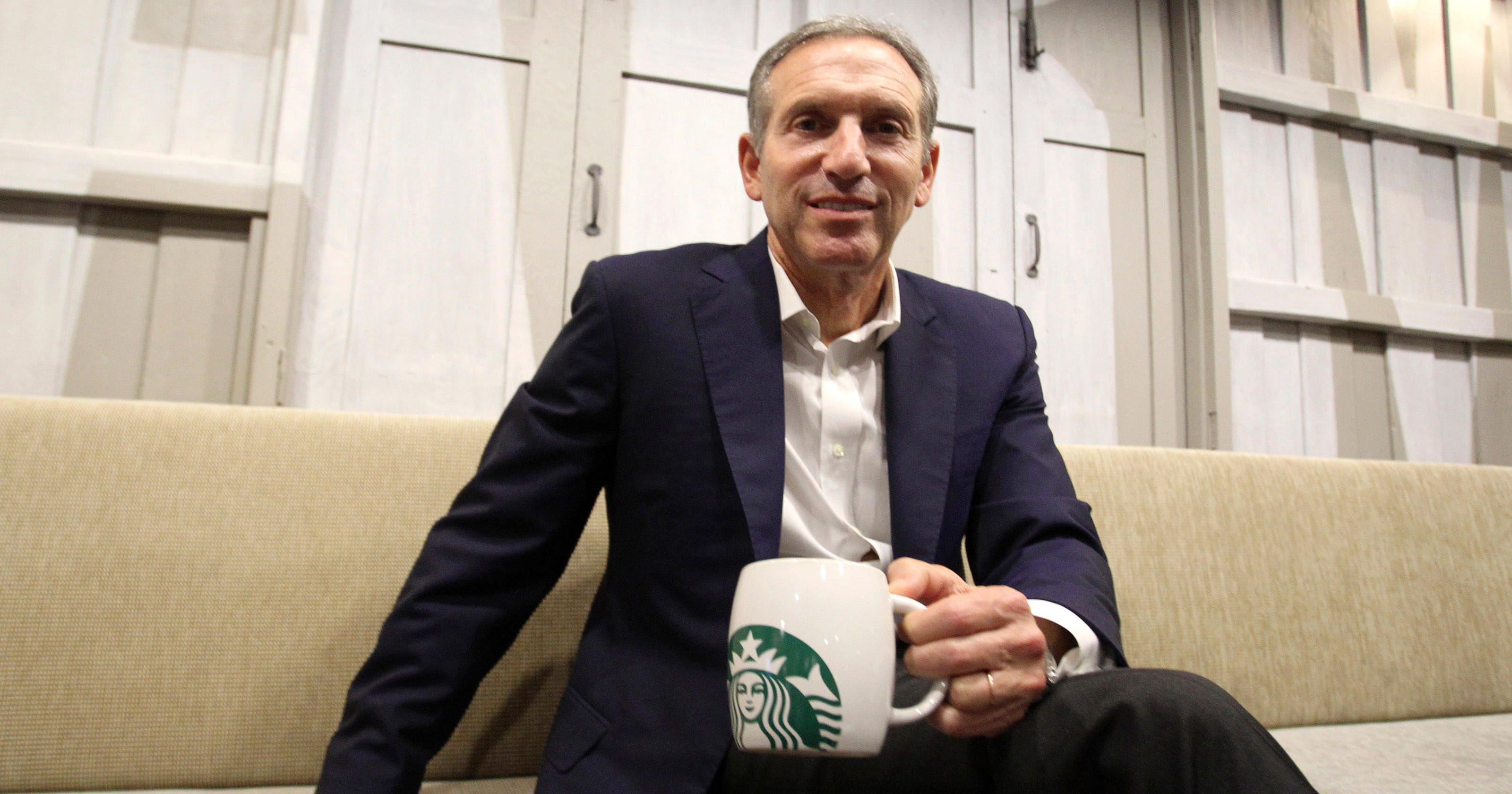 Starbucks CEO says guns not welcome in stores