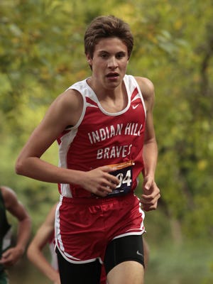 Indian Hill’s Joe Murdock has a great stride as he nears the halfway point of the Mason Invitational.