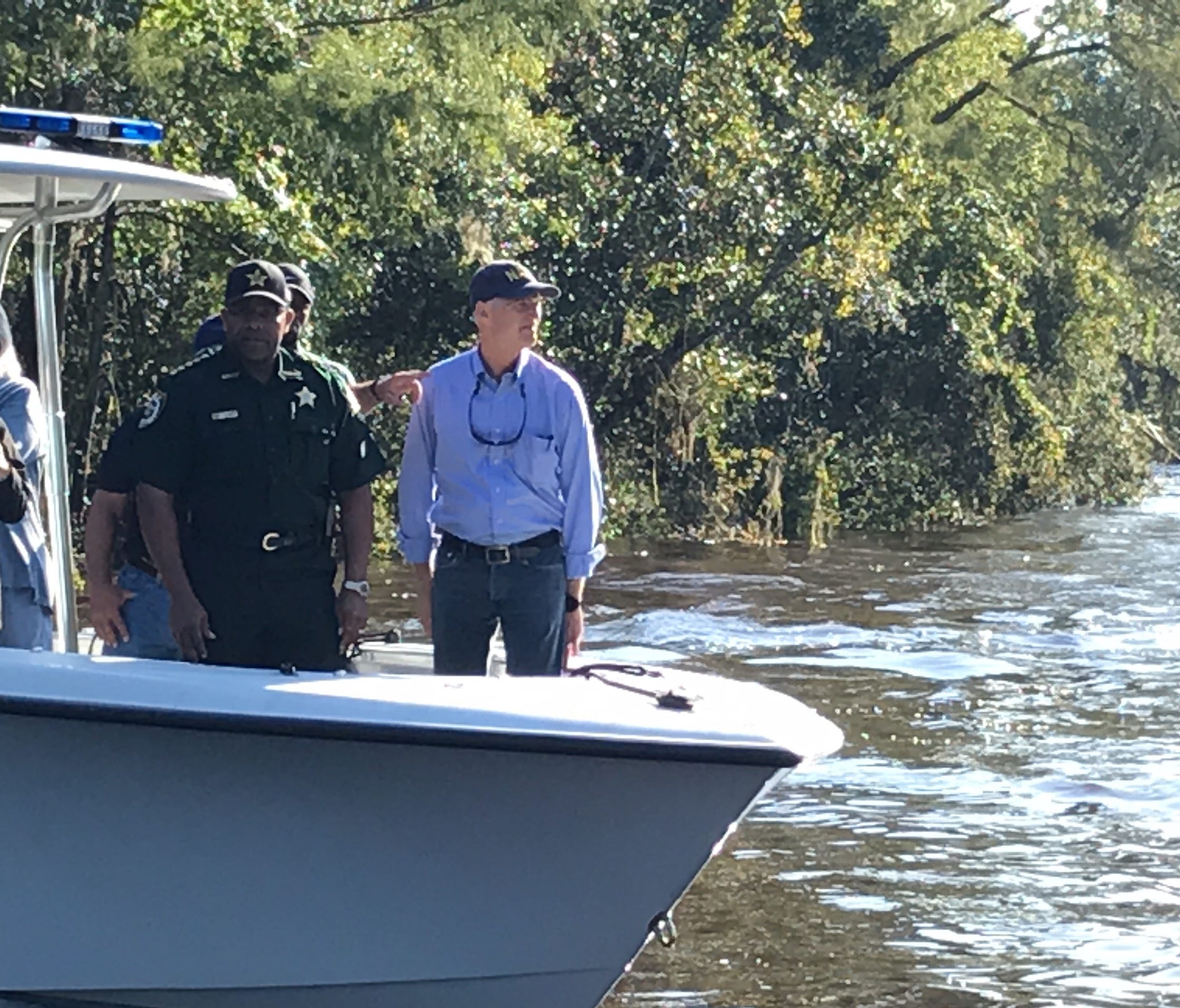 Gov. Rick Scott toured Clay County homes along Black Creek that were damaged by a flash flood caused by Hurricane Irma.