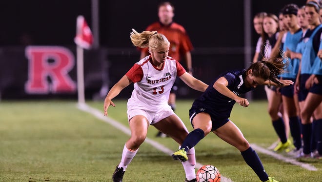 Maggie Morash (left, in white) captained Rutgers women's soccer for two straight years.