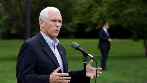 Republican vice presidential candidate, Indiana Gov. Mike Pence comments after receiving a national security briefing in Indianapolis, Friday, Sept. 9, 2016. (AP Photo/Michael Conroy)