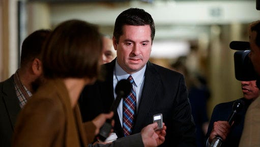 House Intelligence Committee Chairman Rep. Devin Nunes, R-Calif. is pursued by reporters as he arrives for a weekly meeting of the Republican Conference with House Speaker Paul Ryan and the GOP leadership, Tuesday, March 28, 2017, on Capitol Hill in Washington. Nunes is facing growing calls to step away from the panel's Russia investigation as revelations about a secret source meeting on White House grounds raised questions about his and the panel's independence.