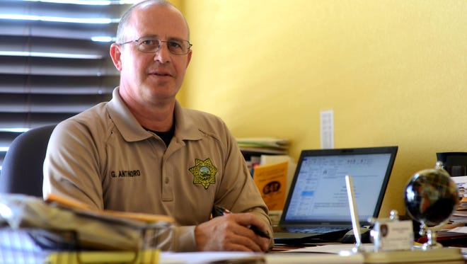 A file photo showing Storey County Sheriff Gerald Antinoro sitting at his desk in his office in Virginia City on March 21, 2016. Antinoro faces a defamation lawsuit filed by Commissioner Lance Gilman.