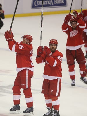 Detroit Red Wings wave to the fans after their 3-0 win over the Philadelphia Flyers on Wednesday, April 6, 2016, at Joe Louis Arena.
