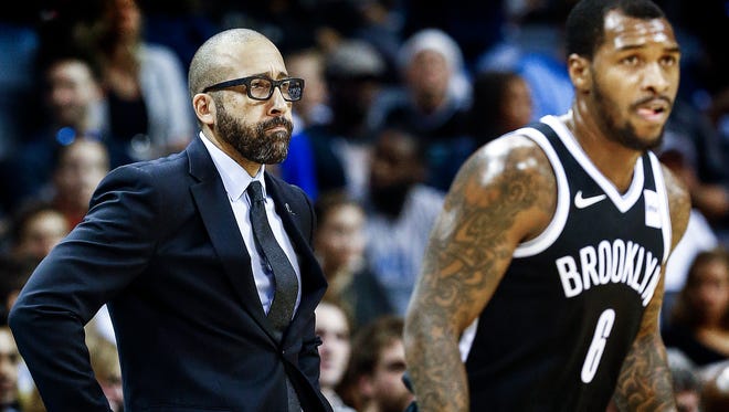 Memphis Grizzlies head coach David Fizdale (left) looks on during a 98-88 loss to the Brooklyn Nets at the FedExForum in Memphis, Tenn., Sunday, November 26, 2017.