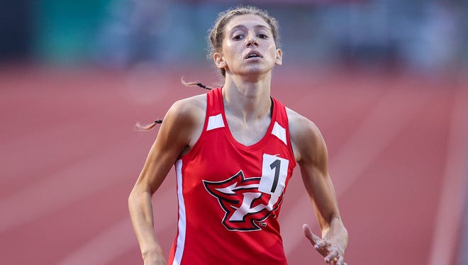Elizabeth Stanhope finished the 800 meter run in 2 minutes, 10.16 seconds at a sectional track and field meet at Pike High School in Indianapolis, Tuesday, May 15, 2018. Stanhope has been home schooled her entire life, previously practicing twice a week with a home-schooled team. This year, the high school junior enrolled in one class at Pike, qualifying her to compete with the team. Her sectional time is fastest in the state this year, No. 11 in the nation and No. 6 in Indiana history.