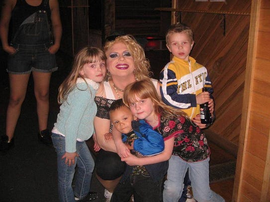 Shown here performing as Madonna, Katrina will read