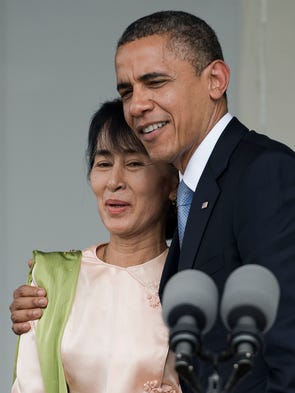 President Obama hugs Myanmar pro-democracy leader Aung