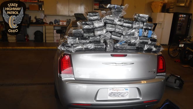 Troopers stopped a car on the Ohio Turnpike that carried 165 pounds of cocaine