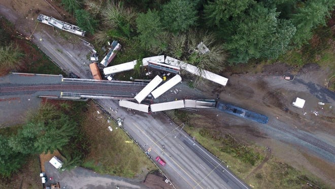 An Amtrak train derailed Dec. 18, 2017, near DuPont, Wash., after heading into a 30 mph curve at about 80 mph, according to investigators for the National Transportation Safety Board. The derailment killed three passengers.