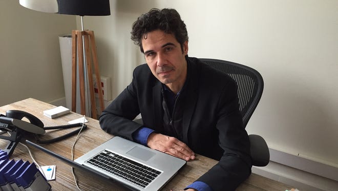 Paul Moreira in his office in Paris on April 3, 2015. The documentary maker and journalist is the head of a company that shared a building with the satirical newspaper "Charlie Hebdo." Moreira's staff were the first to respond to the incident that killed 12 people, including the newspaper's editor.