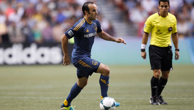 LA Galaxy forward Landon Donovan (10) looks for an open teammate against the Vancouver Whitecaps FC during the second half at BC Place.