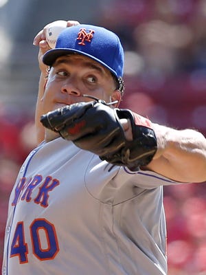 Mets starting pitcher Bartolo Colon pitched six scoreless innings in a 5-0 victory over the Reds.