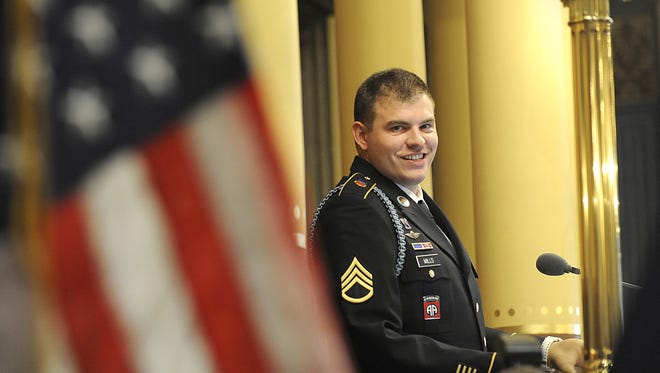 
Army Sgt. Travis Mills speaks May 23, 2013, in the Senate during the 19th annual Memorial Service.
