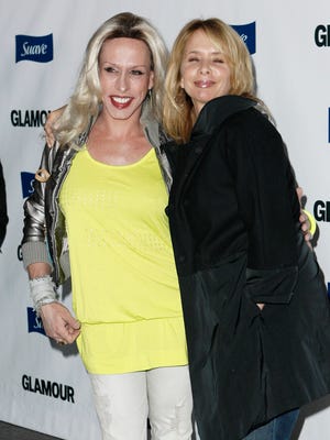 Rosanna Arquette, right, and Alexis Arquette pose together at Glamour Reel Moments in Los Angeles on Oct. 14, 2008.  The event featured the premieres of short films inspired by the stories of the magazine's readers.