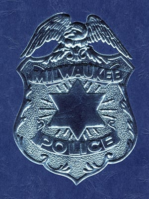 Milwaukee Police Department badge.