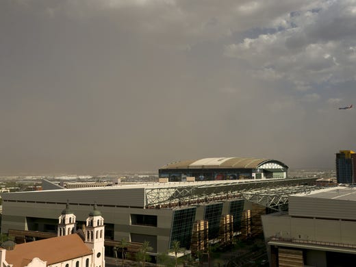 The first dust storm of the season passes through downtown