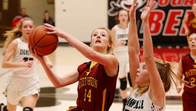 McCutcheon's Olivia Dowden drives to the basket in last year's sectional against eventual champion Zionsville.