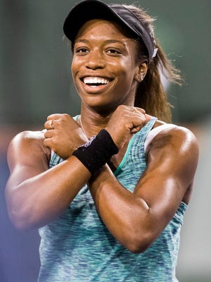Sachia Vickery of the United States of America celebrates her win against Garbine Muguruza of Spain on Stadium 1 at the 2018 BNP Paribas Open at indian Wells Tennis Garden on March 9, 2018.