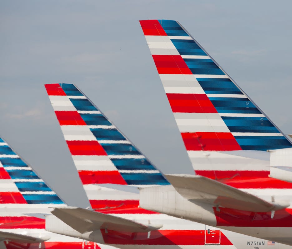 American Airlines' Boeing 777 tails line up at Dallas/Fort Worth International Airport on Oct. 14, 2016.
