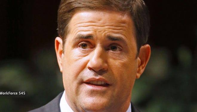 Gov. Doug Ducey's "dark money" backers are defending him from attacks by Mesa's school superintendent.