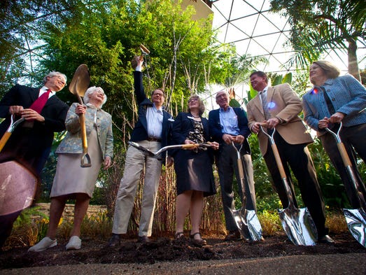 On Thursday March 7, 2013 - (l-r)Frank Cownie, Mayor of Des Moines, Polly Moore, original Botanical Garden board member, Tom Urban(arm raised), Greater Des Moines Botanical Garden, Stephanie Jutila, Greater Des Moines Botanical Garden, Fred Weitz, Greater Des Moines Botanical Garden, Mike Tousley, The Weitz Company, and Susan Bunz, DuPont Pioneer at the ceremonial groundbreaking at the Greater Des Moines Botanical Garden.