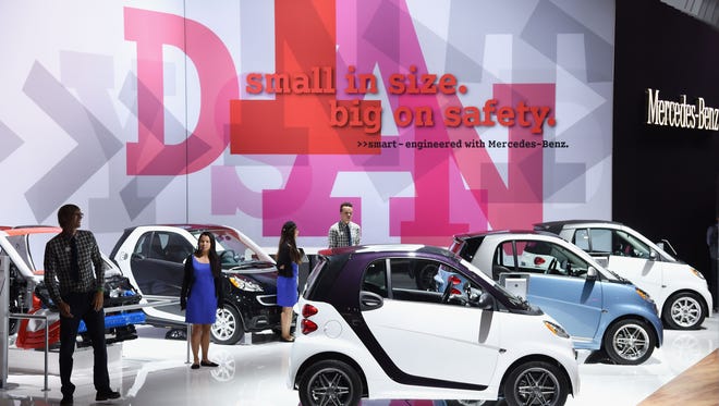 Smart cars were shown in the 2014 Los Angeles Auto Show.