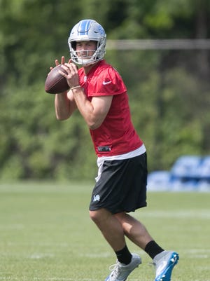 Lions quarterback Matthew Stafford goes through drills during OTAs on Wednesday, May 24, 2017 at the Allen Park practice facility.