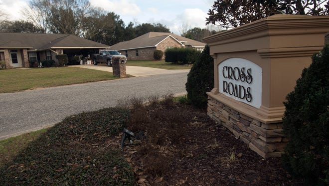 Residents of the  Cross Roads subdivision in Milton petitioning the county to close the Berryhill Road entrance to their neighborhood. The residents are citing an increase in the through traffic to Chumuckla Hwy. for the closure.