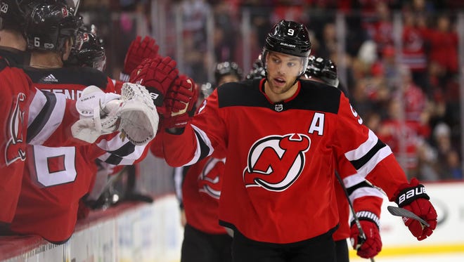 New Jersey Devils left wing Taylor Hall (9) celebrates his goal during the first period of their game against the Los Angeles Kings at Prudential Center.