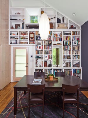 Architect J.C. Schmeil's dining room doubles as a library.