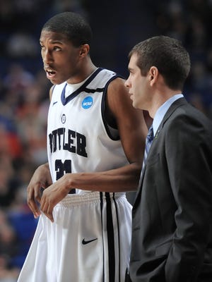 FILE -- Butler's Kameron Woods talks with head coach Brad Stevens during the 2013 NCAA tournament.