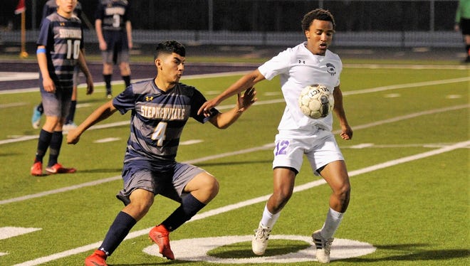 Wylie midfielder Josiah Tuegel (12) settles the ball during the Bulldogs' 1-0 loss to Stephenville at Bulldog Stadium on Tuesday, March 20, 2018.