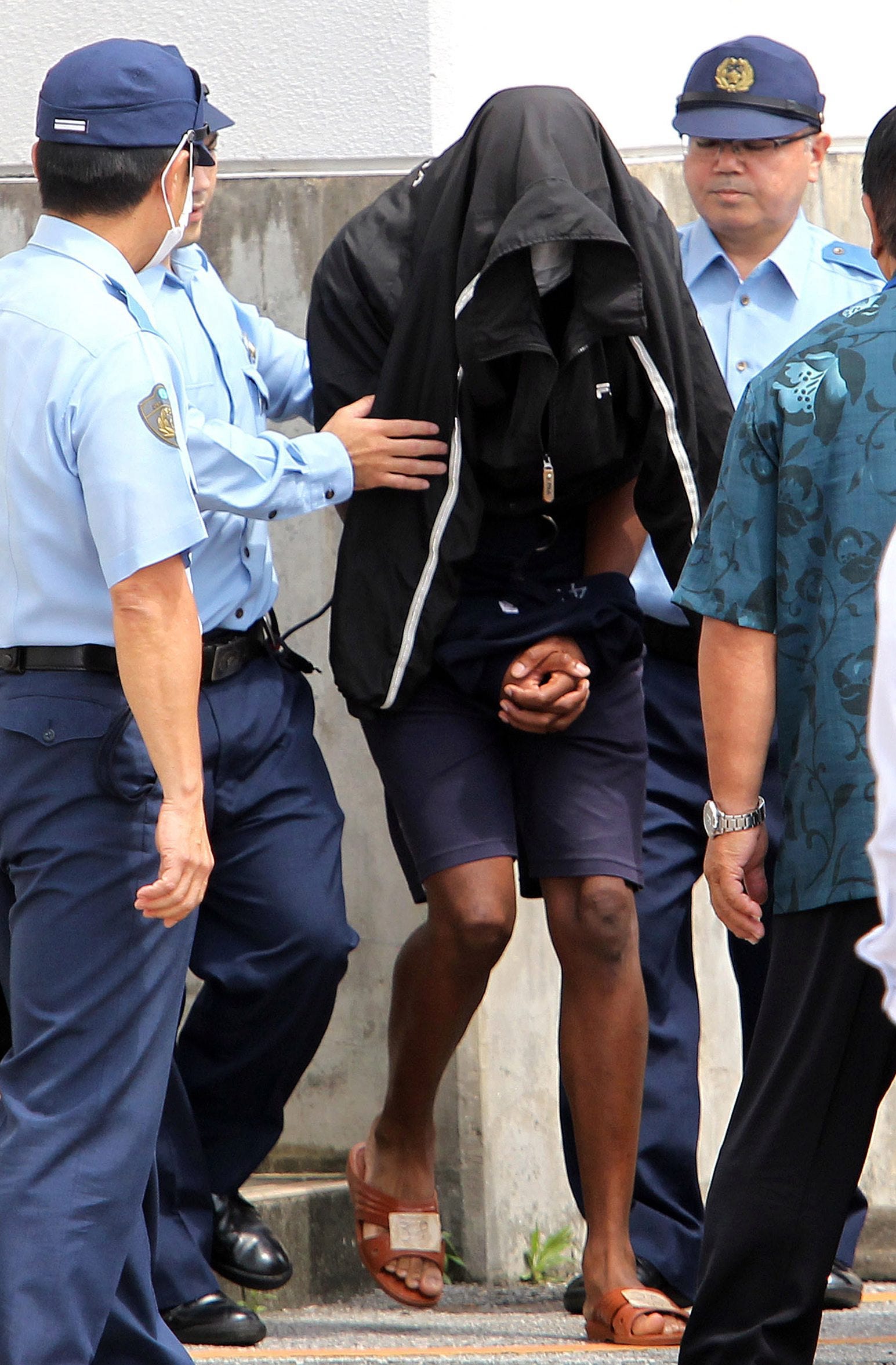 ExU.S. vet's arrest in Okinawa woman's death stirs outrage