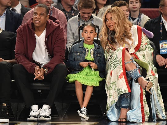 Jay Z, Blue Ivy Carter and Beyoncé Knowles took in