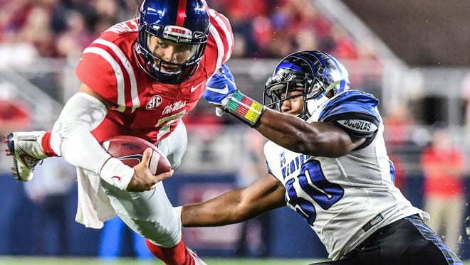 Ole Miss quarterback Jason Pellerin (7) rushed for two touchdowns in the Rebels' 48-28 win against Memphis.