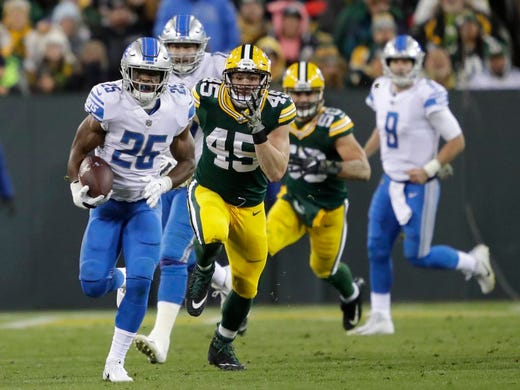 Detroit Lions running back Theo Riddick (25) breaks