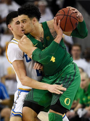 Oregon Ducks forward Dillon Brooks (24) posts up on UCLA Bruins guard Lonzo Ball (2) during the second half at Pauley Pavilion. The UCLA Bruins won 82-79.