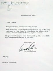 Personal letters written by Arnold Palmer are displayed