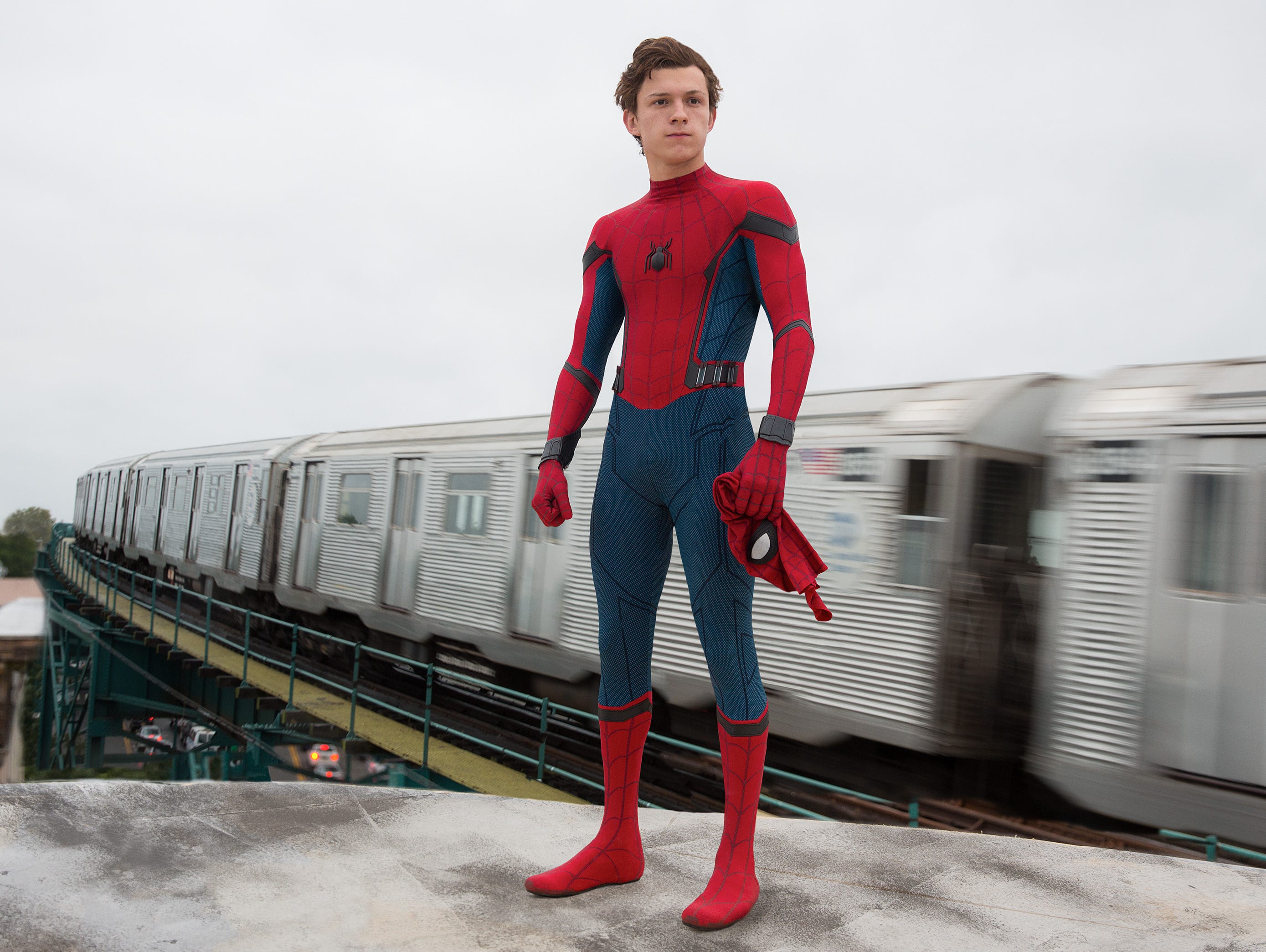 Peter Parker (Tom Holland) juggles school life and his new superhero gig in 'Spider-Man: Homecoming.'