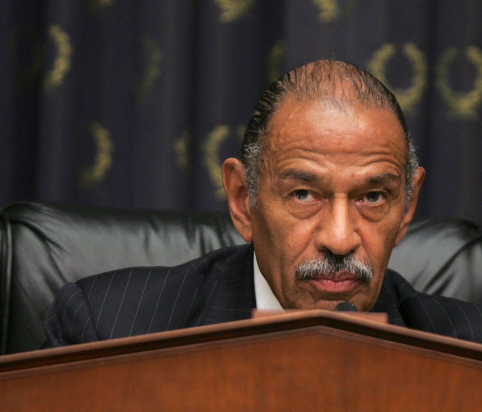 House Judiciary Committee Chairman Rep. John Conyers, D-Mich. listens as former Justice Department White House liaison Monica Goodling testified before the committee on Capitol Hill in Washington, Wednesday, May 23, 2007.