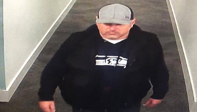 Bremerton Police Department released this photo, taken from surveillance footage, of a person of interest in New Year's Day arson at the Spyglass apartment complex.