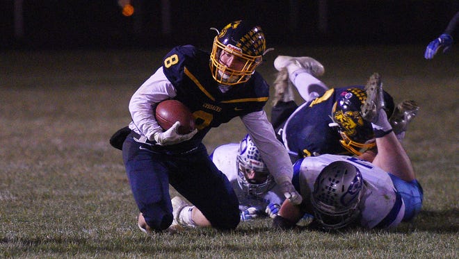 Sioux Valley's Daymein Lucas pushes the ball past Bridgewater-Emery-Ethan's defense Friday, Nov. 3, in Volga.