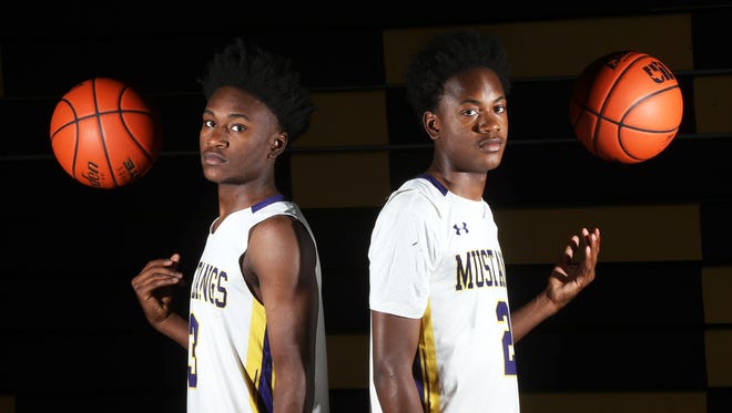 Senior Jawaun Newton, left, and brother Tristen Newton, a junior, are a formidable force on the Burges Mustangs basketball team.