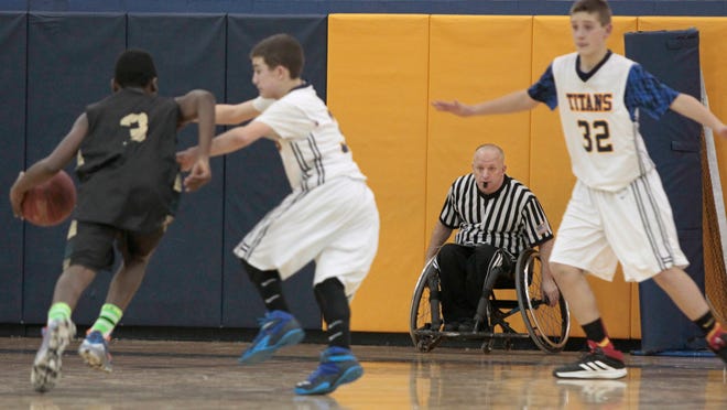 Joe Slaski is the only referee in Section V basketball to officiate from a wheelchair.
