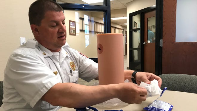 Marshfield Deputy Fire Chief Steve Bakos shows the training items for the Stop the Bleed program. The Fire and Rescue Department want to put kits with items to stop bleeding in trauma patients in every school in the city.