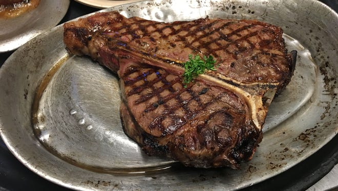 “The Charlie” is the signature steak at Charlie’s, a thick 32-ounce T-bone with perfect grill marks.