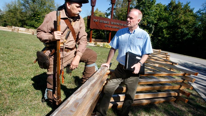 Dave Sayre, left, a reenactor with the "Between the rivers mountain men" visits with William Parker, Historical Interpreter, the sequence of events at Fort Defiance, Sevier Days, on Saturday.