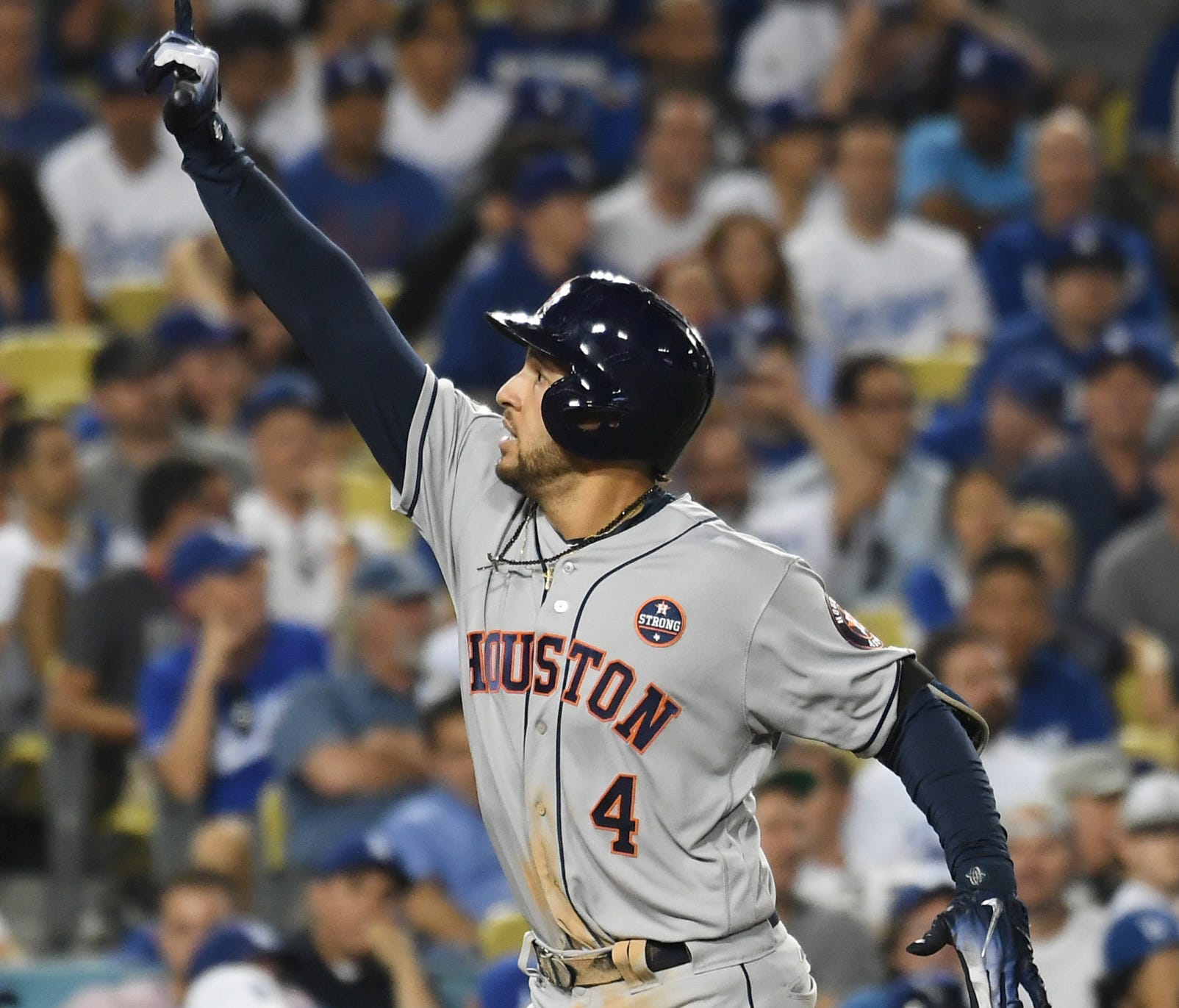 George Springer celebrates his two run home run in the 11th inning.