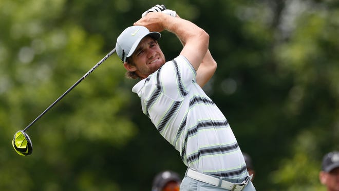 FILE -- Patrick Rodgers tees off at the first hole during the third round of the Memorial Tournament at Muirfield Village Golf Club.